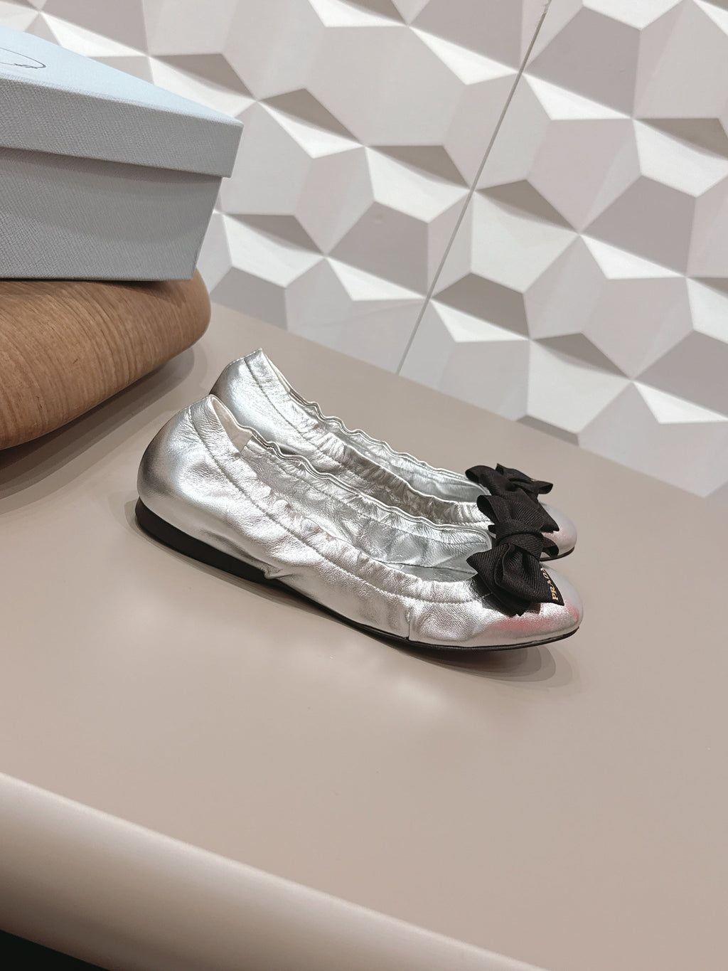 PRADA 26S ROUND TOE FLATS WITH BOW IN SILVER CALFSKIN
