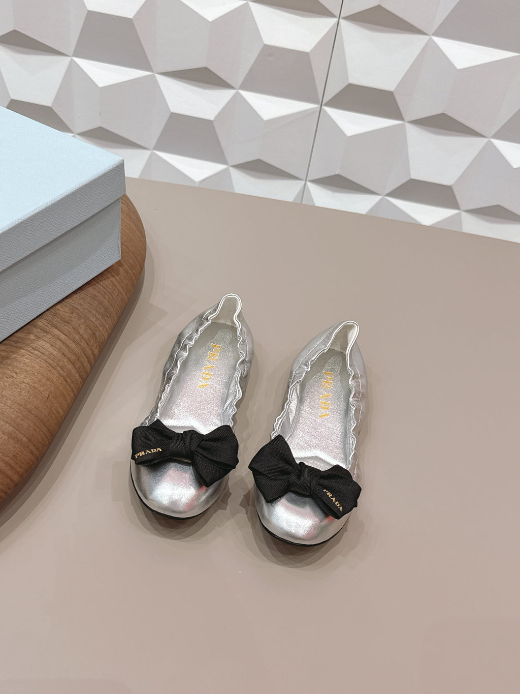 PRADA 26S ROUND TOE FLATS WITH BOW IN SILVER CALFSKIN