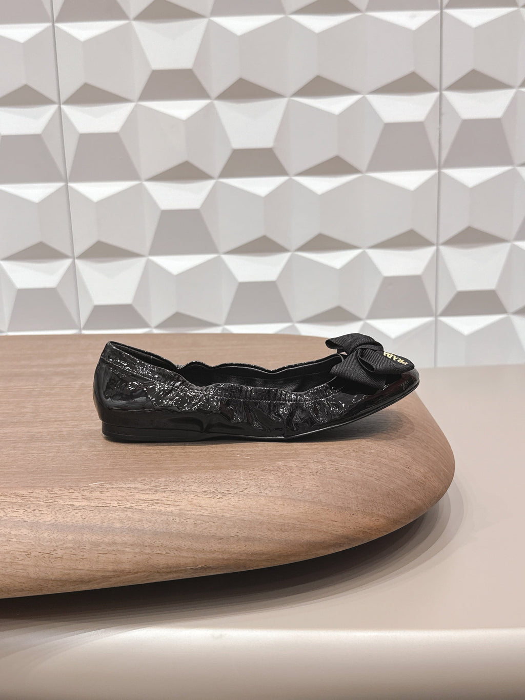 PRADA 26S ROUND TOE FLATS WITH BOW IN BLACK PATENT CALFSKIN