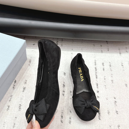 PRADA 26S ROUND TOE FLATS WITH BOW IN BLACK SUEDE