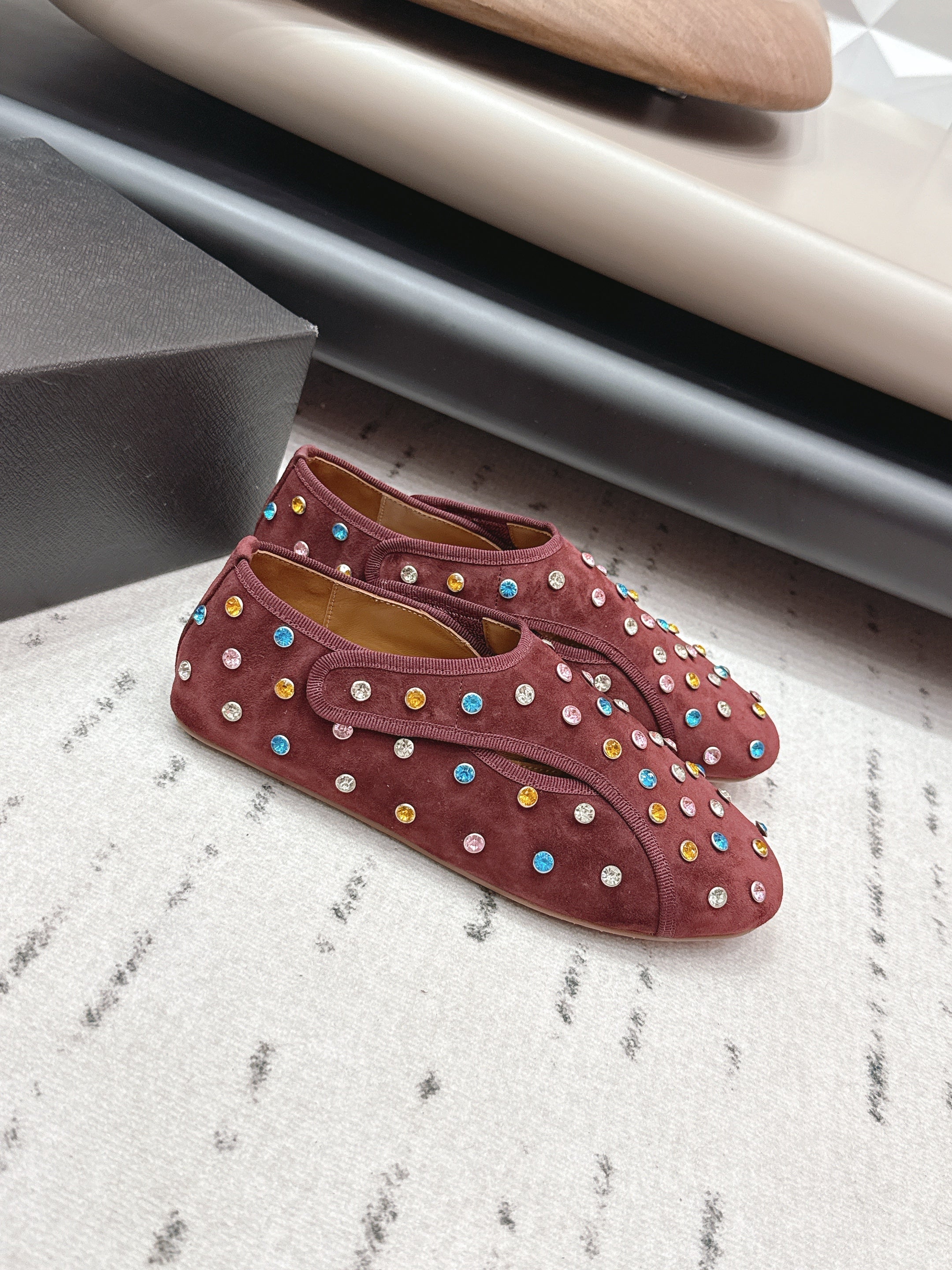 ALAIA 26S EMBELLISHED FLATS IN BROWN SUEDE