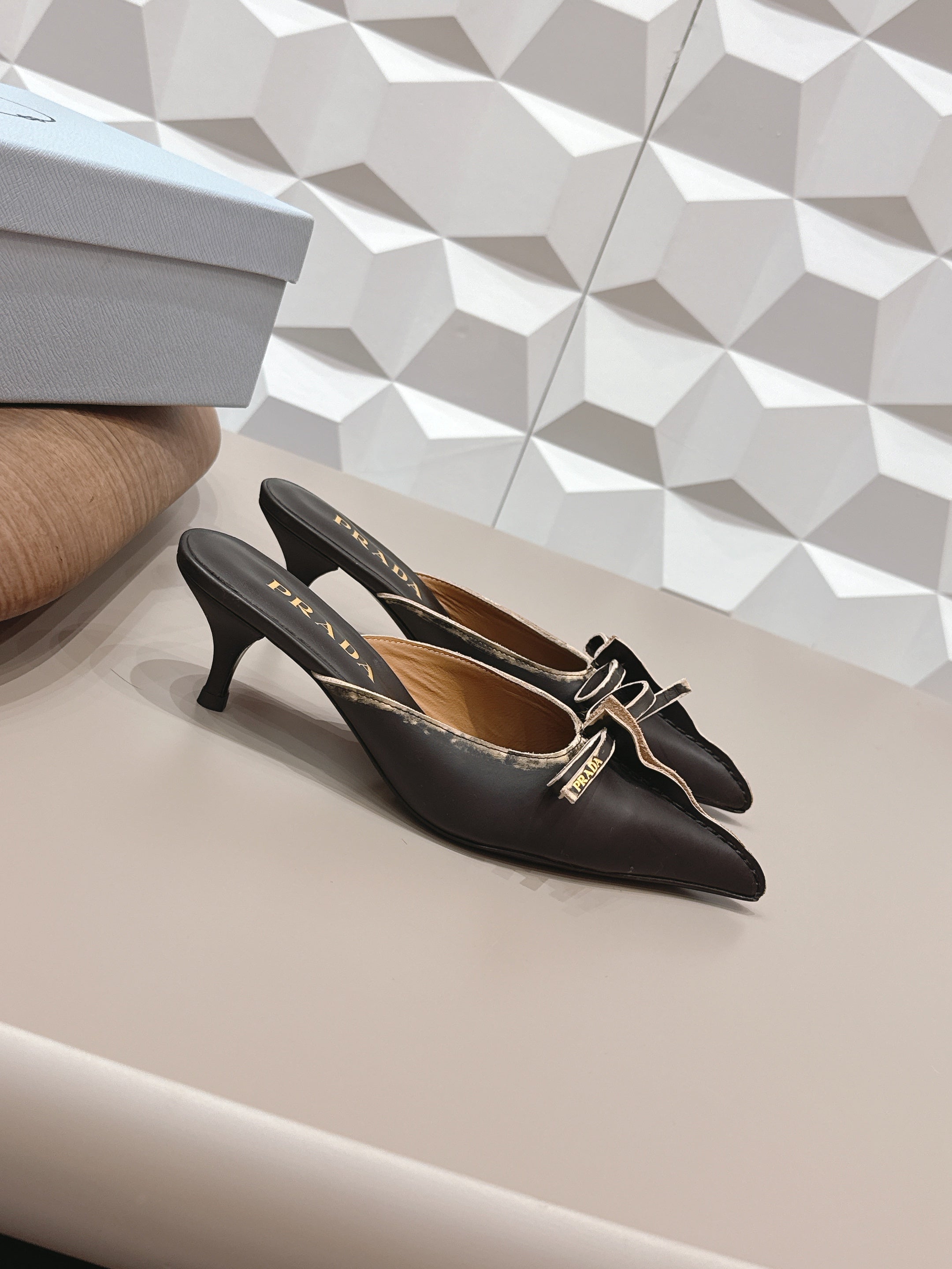 PRADA 26S POINTED TOE LACE TRIM MULES 55MM IN BLACK CALFSKIN WITH BOW