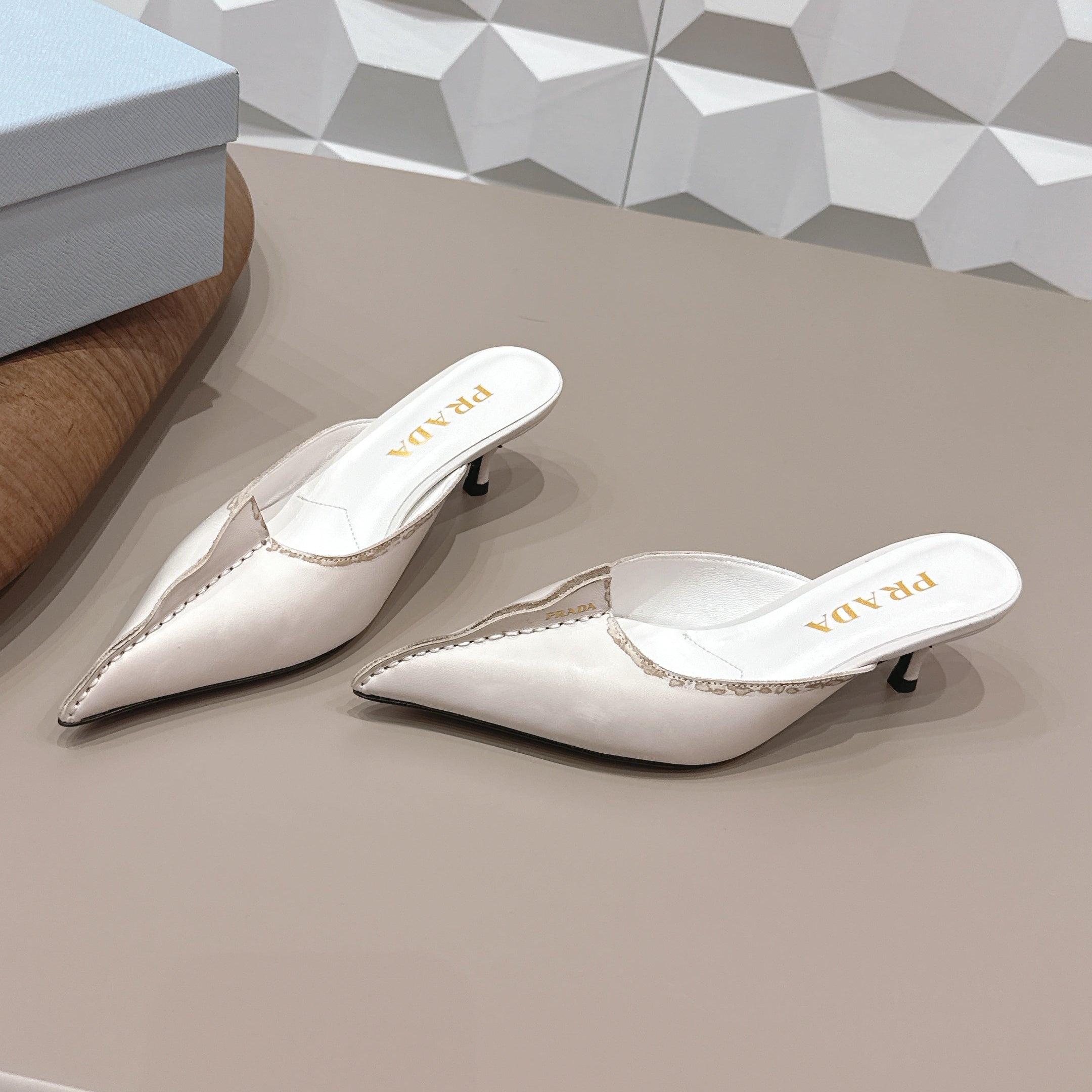 PRADA 26S POINTED TOE LACE TRIM MULES 55MM IN CREAM WHITE CALFSKIN