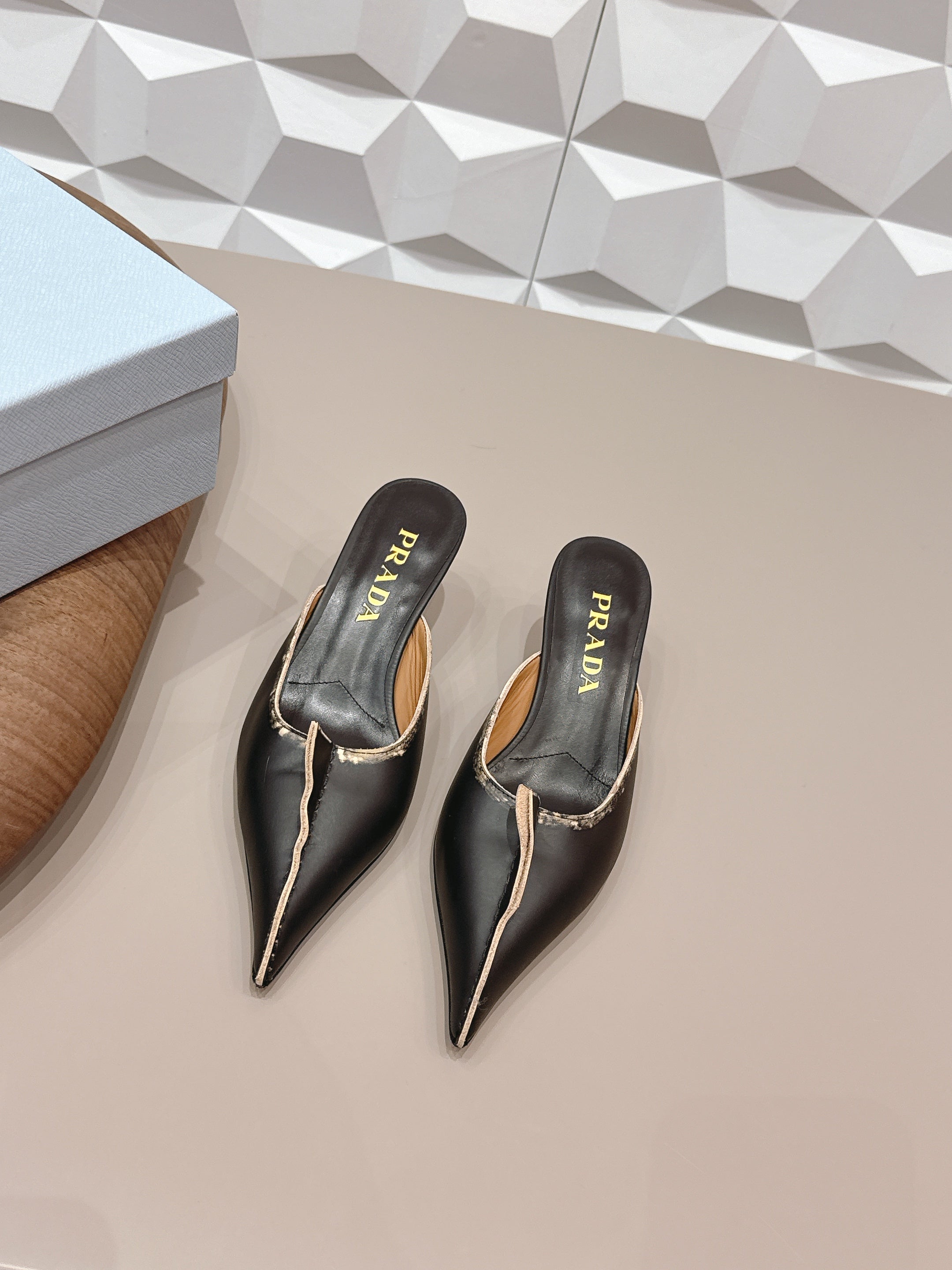 PRADA 26S POINTED TOE LACE TRIM MULES 55MM IN BLACK CALFSKIN
