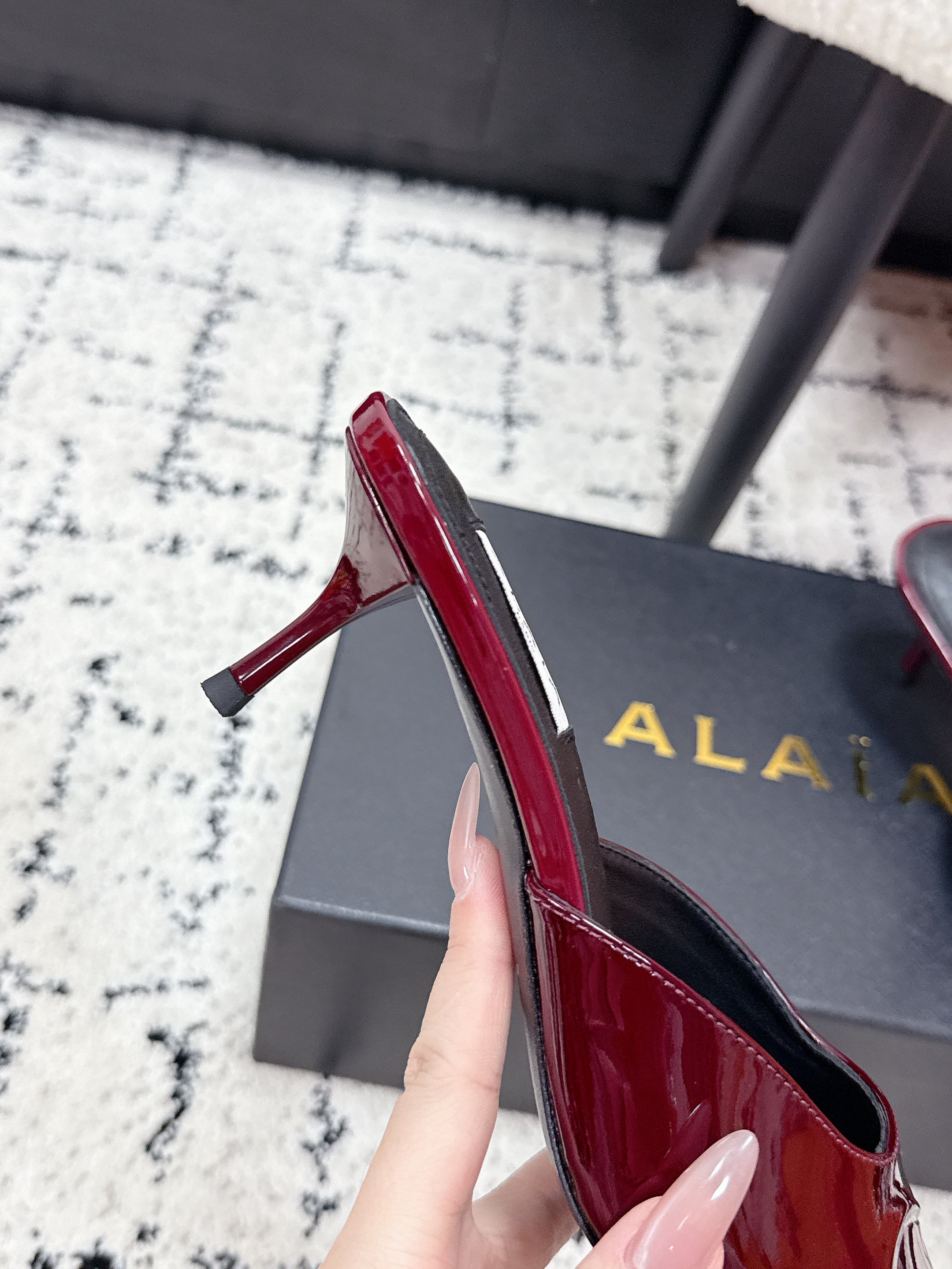 ALAIA 26S HEELED MULES 65 MM IN DARK RED GLOSSY CALFSKIN