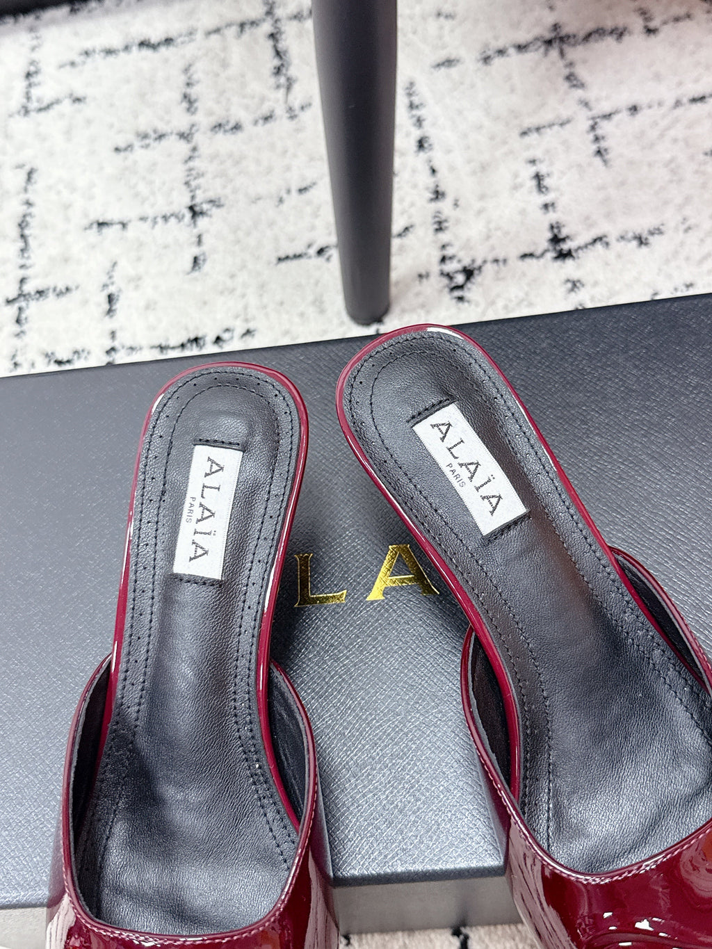 ALAIA 26S HEELED MULES 65 MM IN DARK RED GLOSSY CALFSKIN