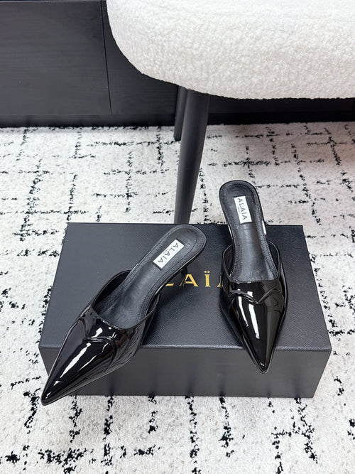ALAIA 26S HEELED MULES 65 MM IN BLACK GLOSSY CALFSKIN