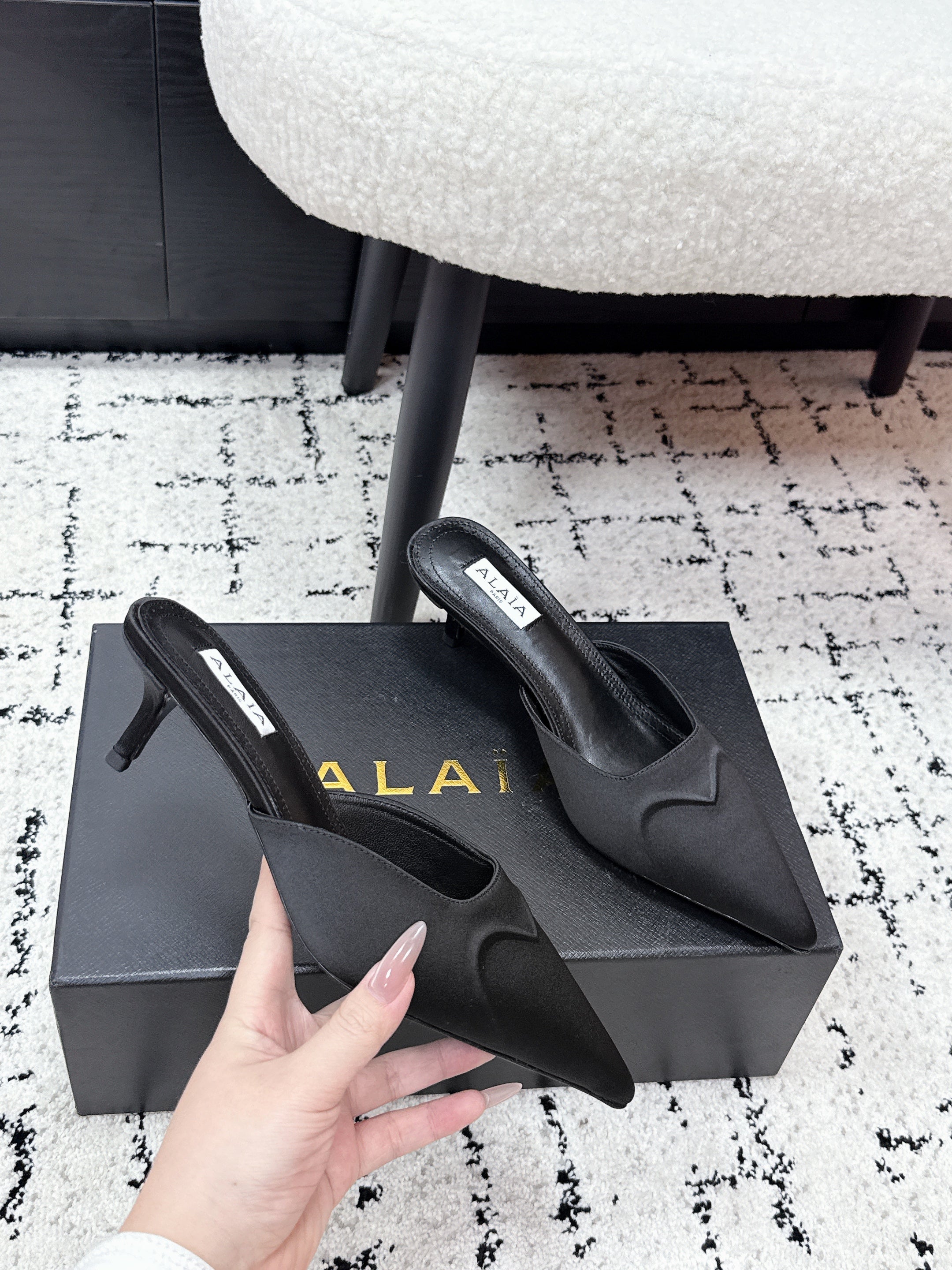 ALAIA 26S HEELED MULES 65 MM IN BLACK SATIN