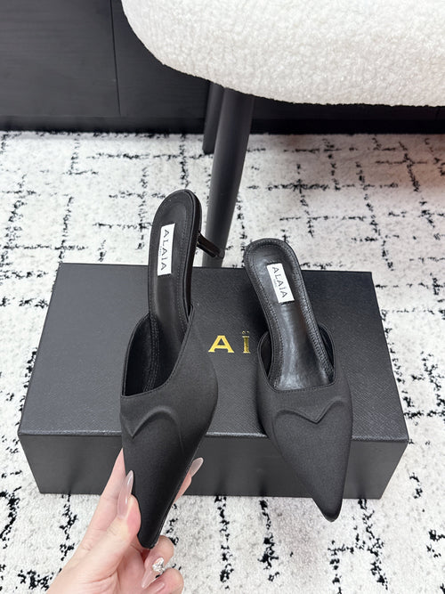 ALAIA 26S HEELED MULES 65 MM IN BLACK SATIN