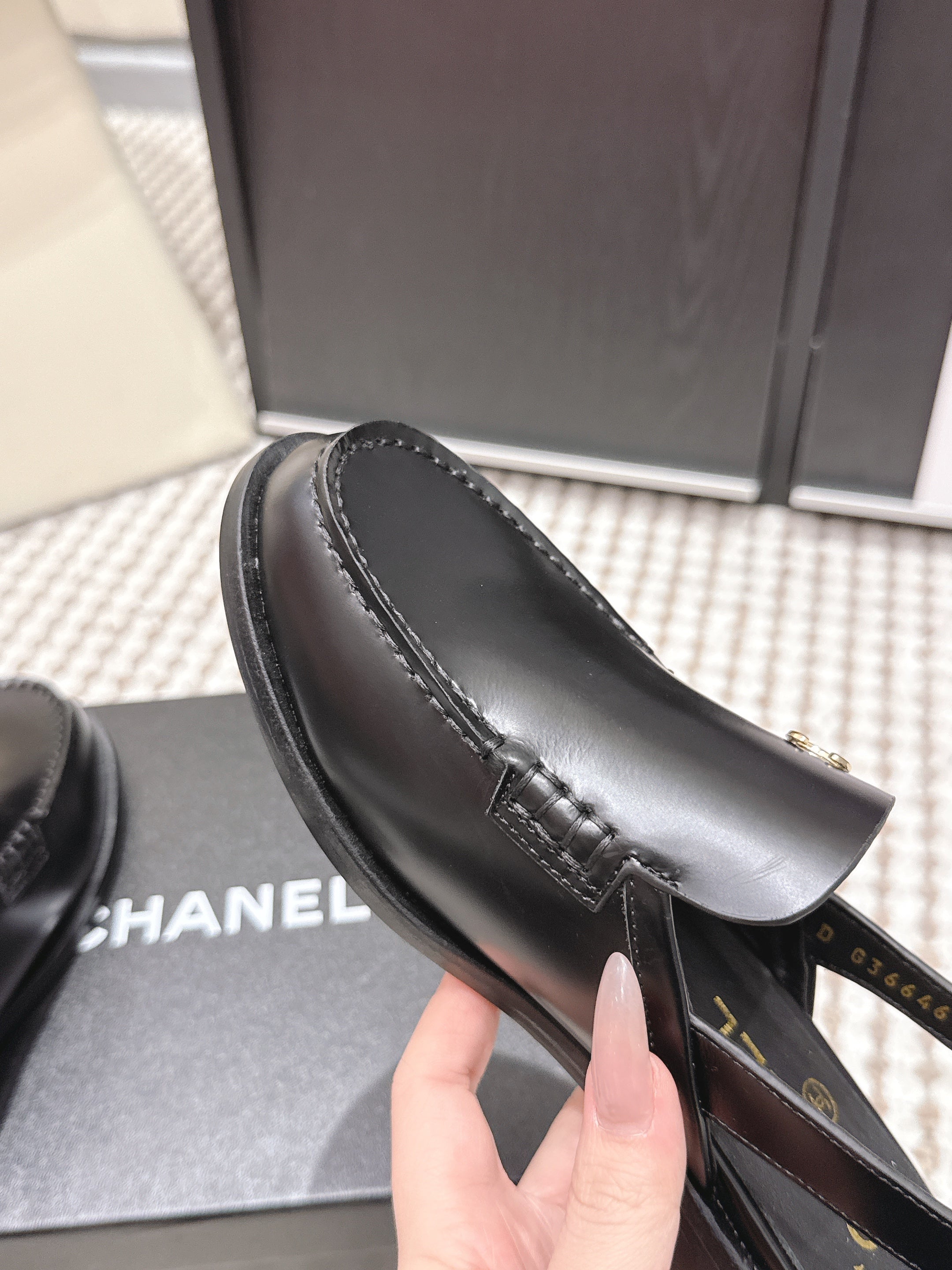 CHANEL 26S SLINGBACK LOAFERS IN BLACK CALFSKIN