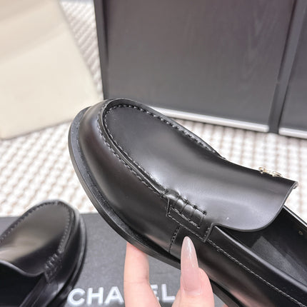 CHANEL 26S LOAFERS IN BLACK CALFSKIN