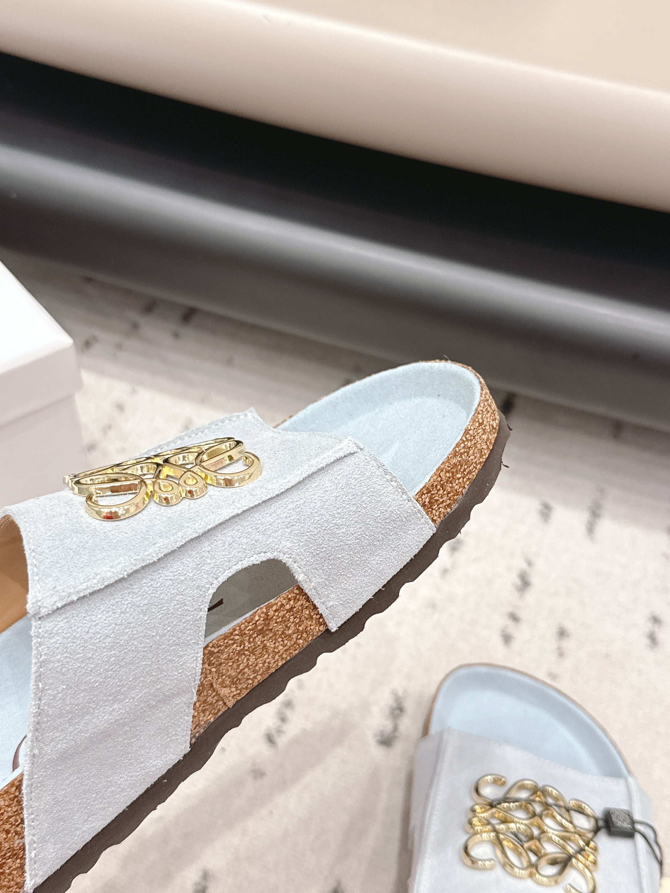 LOEWE 26S FLAT SANDALS IN LIGHT BLUE LOGO GOLD HARDWARE