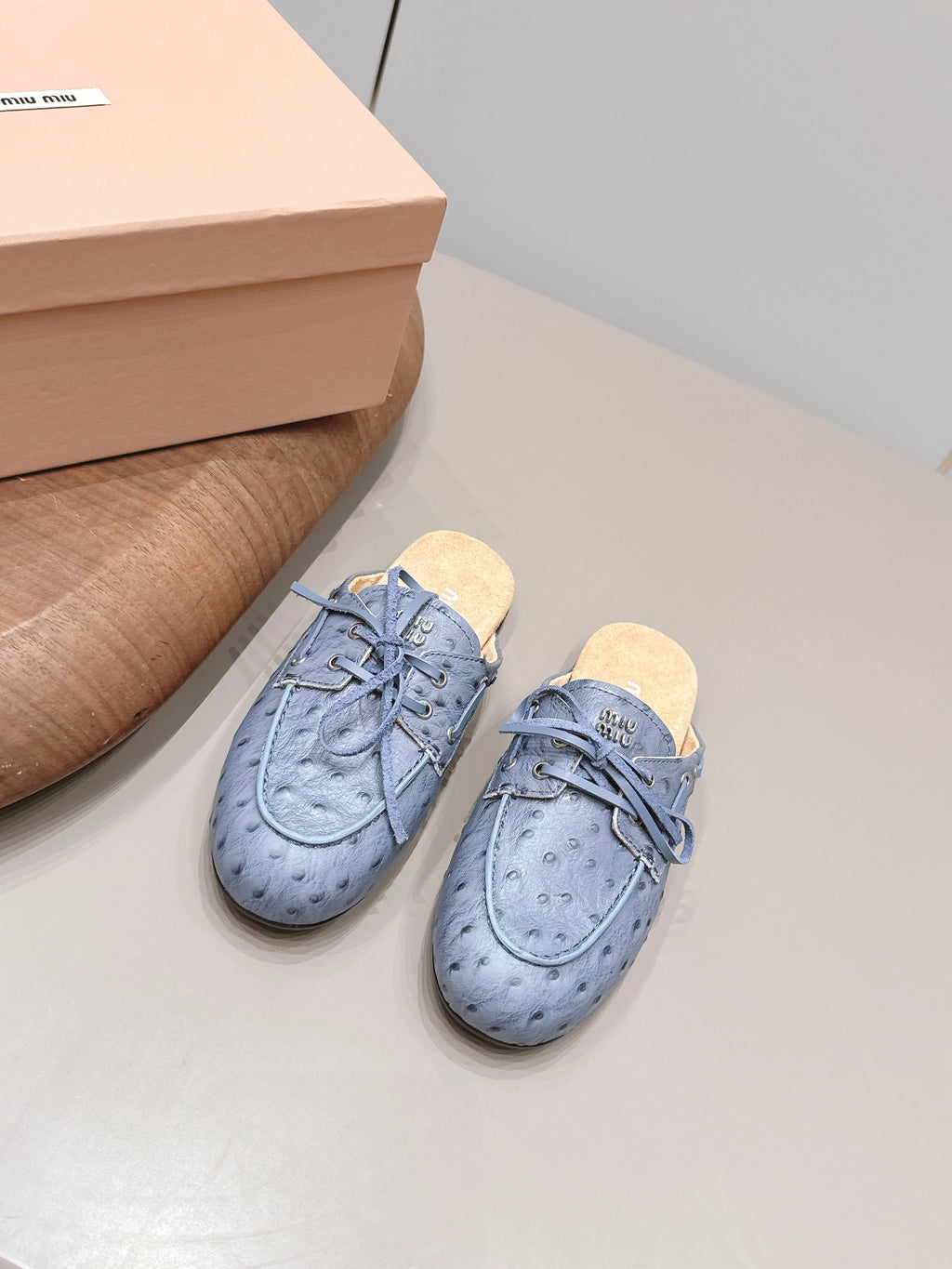 MIUMIU 26S LOAFER MULES IN BLUE CALFSKIN