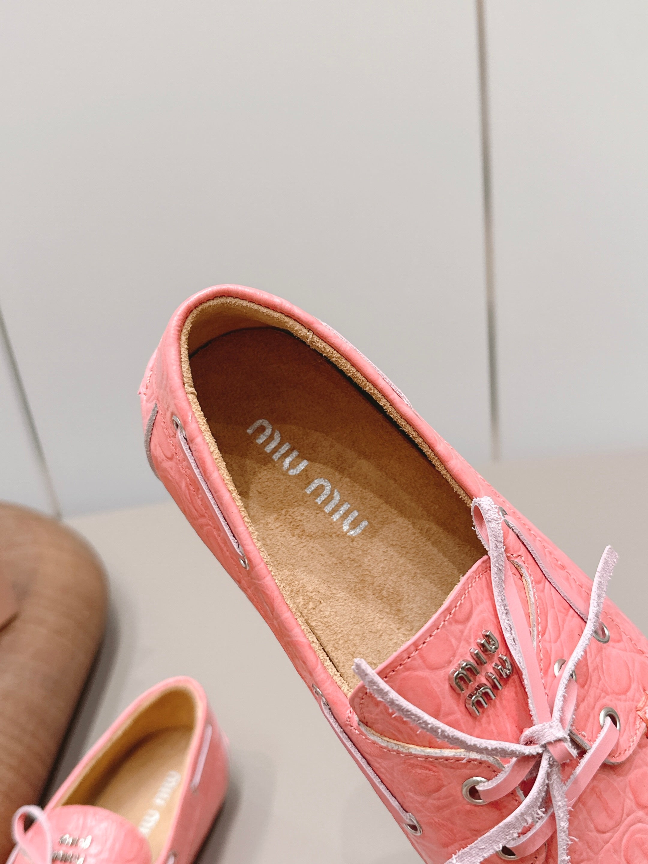 MIUMIU 26S BOAT SHOES IN PINK EMBOSSED CALFSKIN