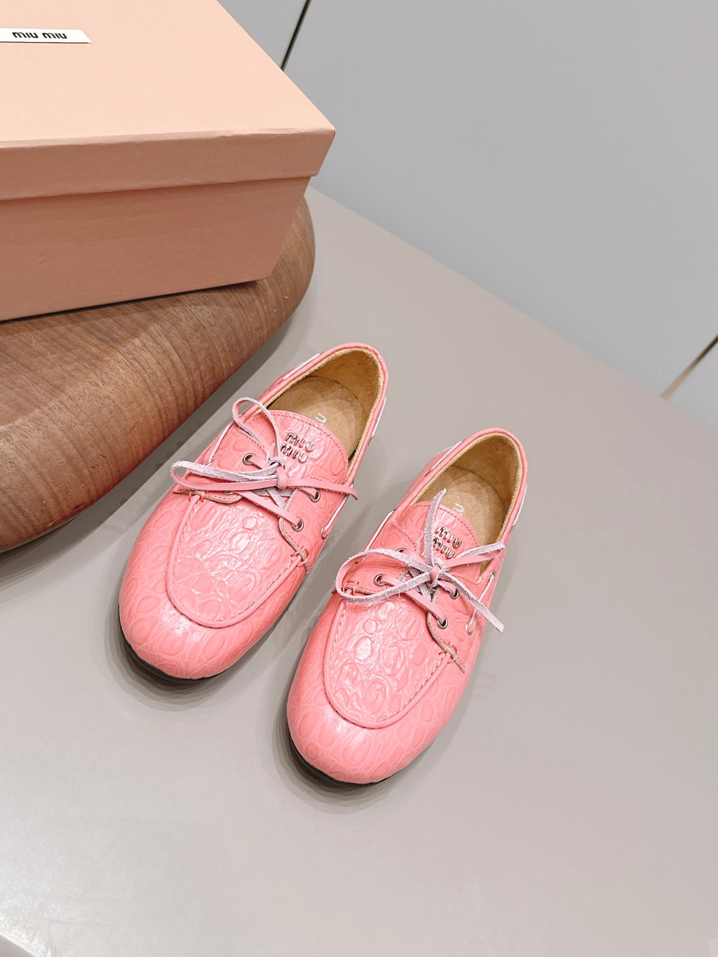 MIUMIU 26S BOAT SHOES IN PINK EMBOSSED CALFSKIN
