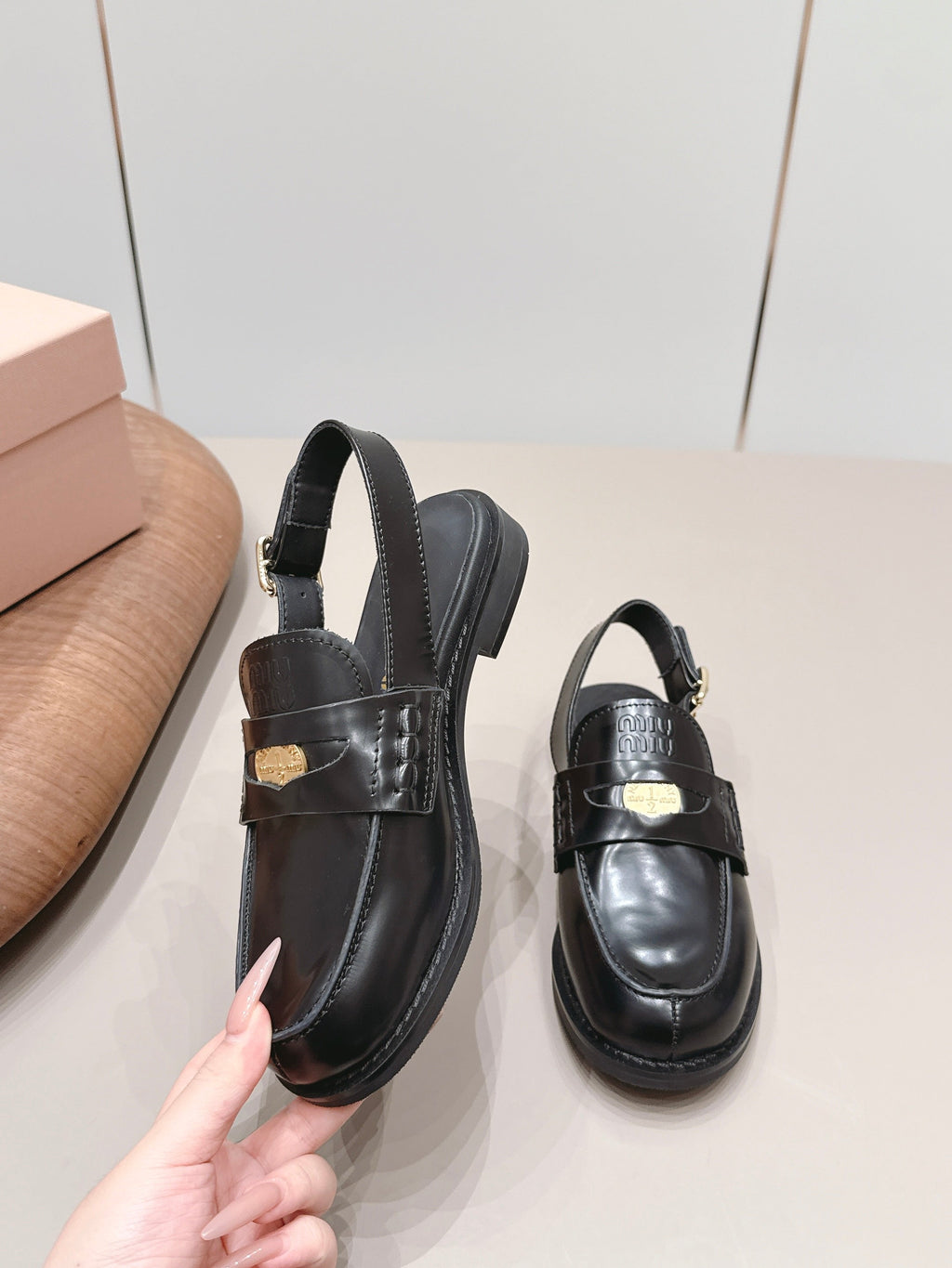 MIUMIU 26S PENNY SLINGBACK LOAFERS IN BLACK CALFSKIN GOLD HARDWARE