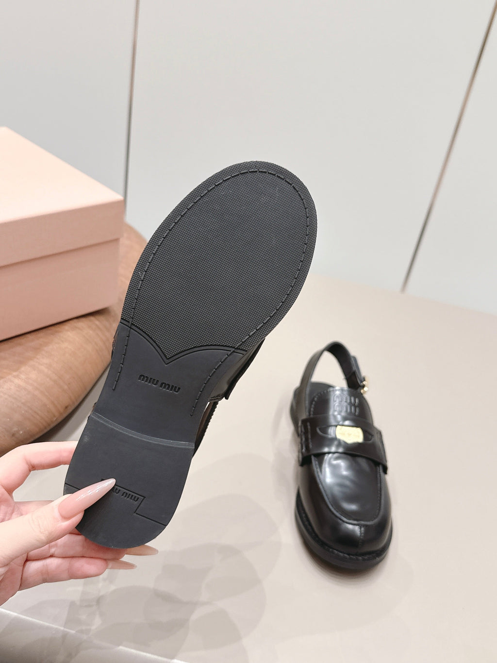 MIUMIU 26S PENNY SLINGBACK LOAFERS IN BLACK CALFSKIN GOLD HARDWARE