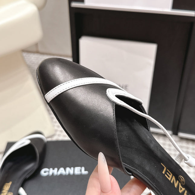 CHANEL 26S SLINGBACK FLATS IN BLACK CALFSKIN WITH WHITE TRIM