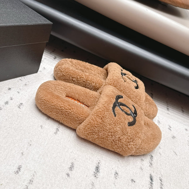 CHANEL 26S SLIDE MULES IN BROWN SHEARLING AND BLACK CC LOGO