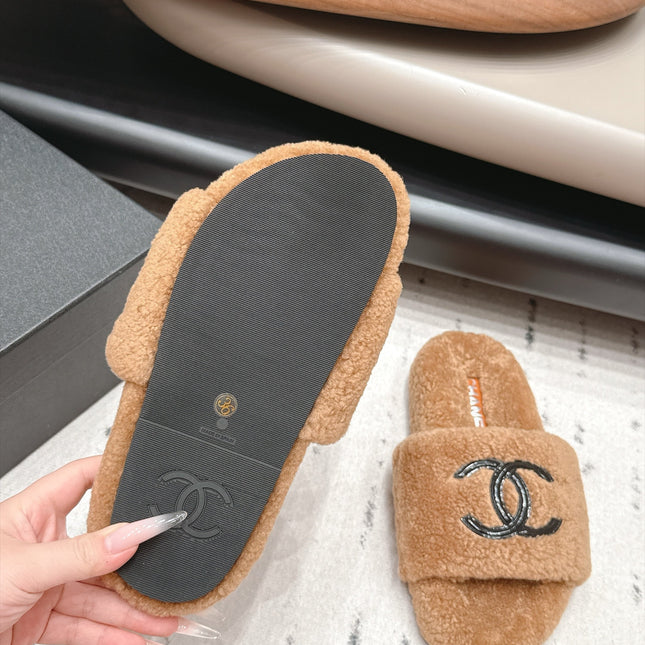 CHANEL 26S SLIDE MULES IN BROWN SHEARLING AND BLACK CC LOGO