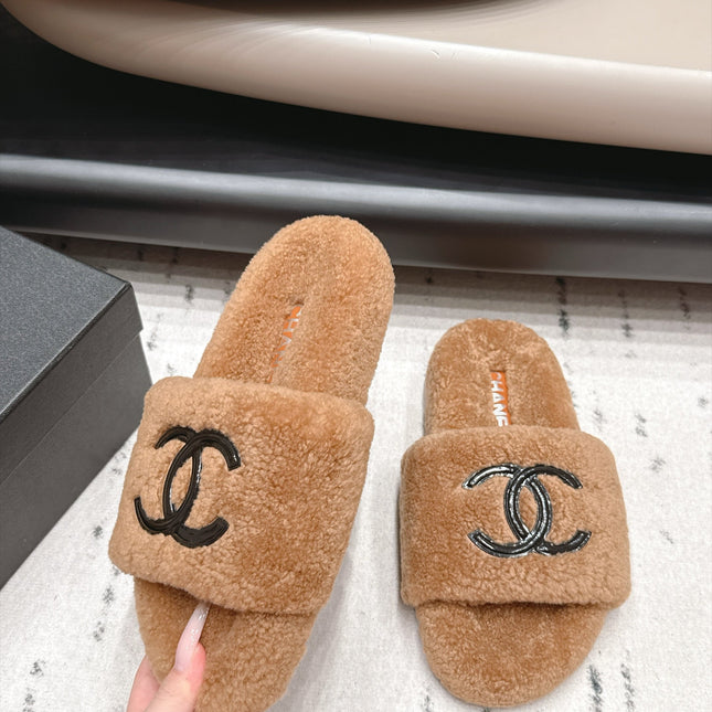 CHANEL 26S SLIDE MULES IN BROWN SHEARLING AND BLACK CC LOGO