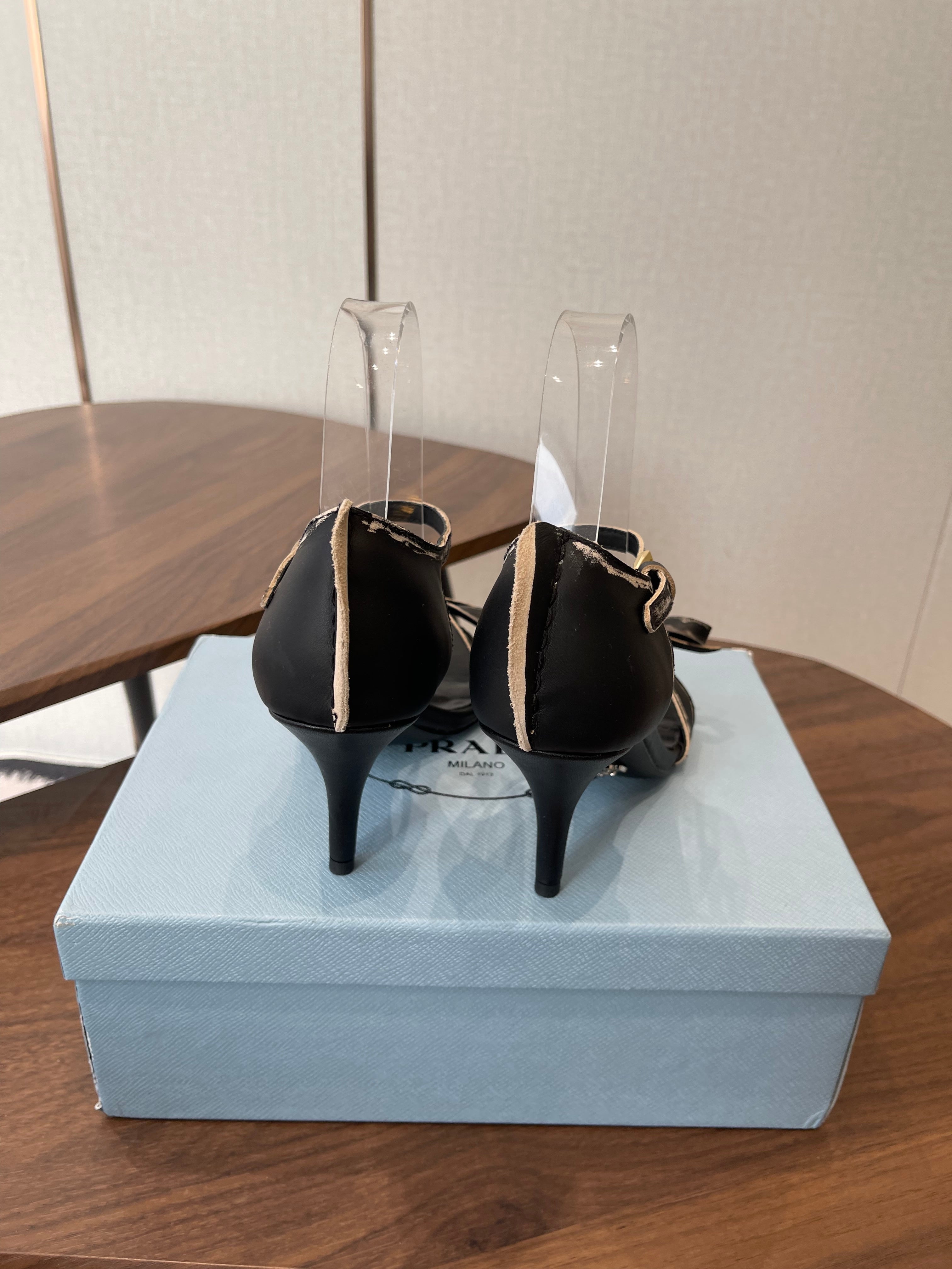 PRADA 26S HIGH HEEL SANDALS 85MM IN BLACK CALFSKIN WITH BOW