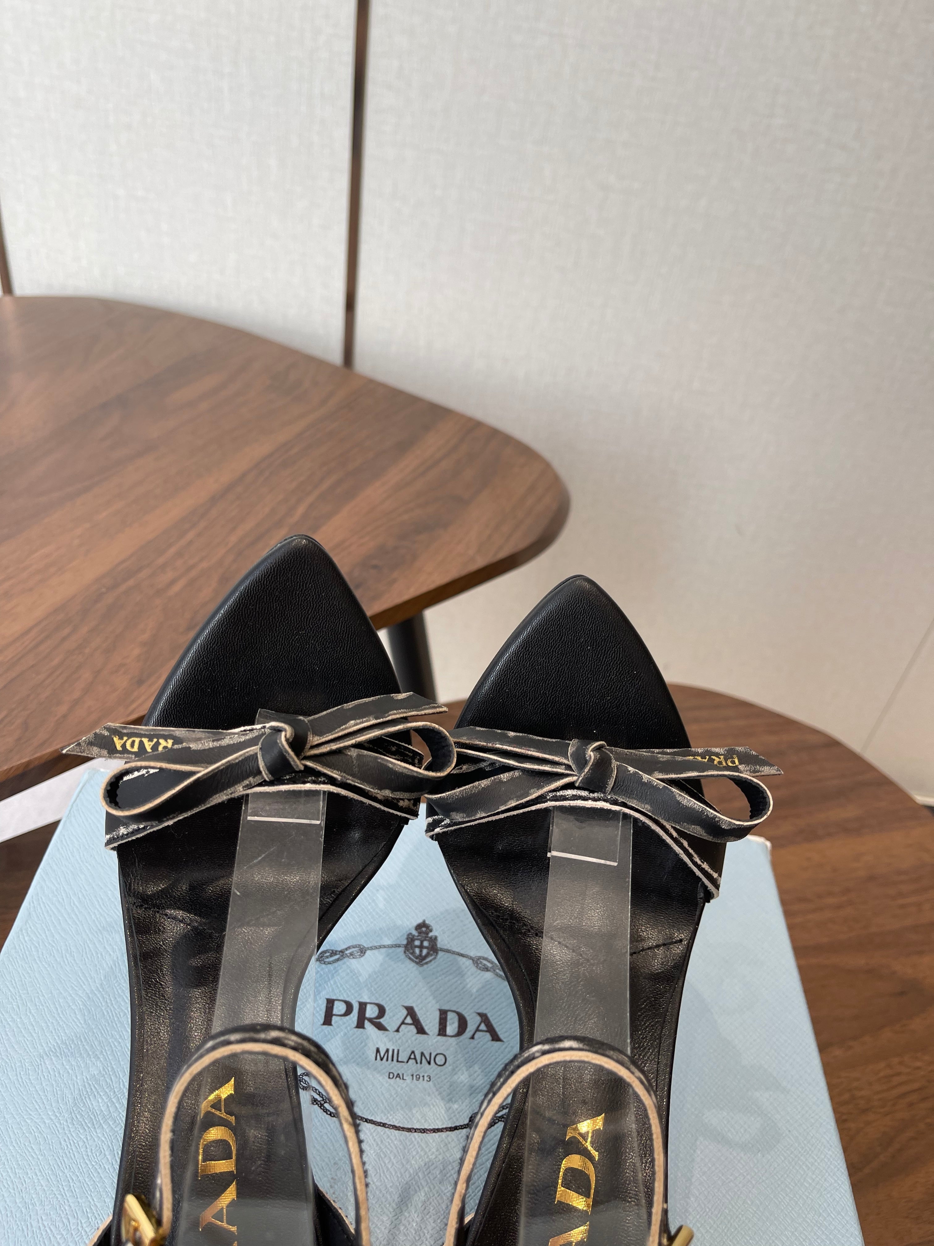 PRADA 26S HIGH HEEL SANDALS 85MM IN BLACK CALFSKIN WITH BOW