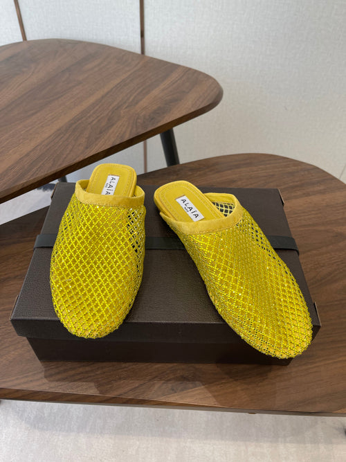 ALAIA 26S FLAT MULES IN DARK YELLOW SUEDE AND MESH RHINESTONE-EMBELLISHED