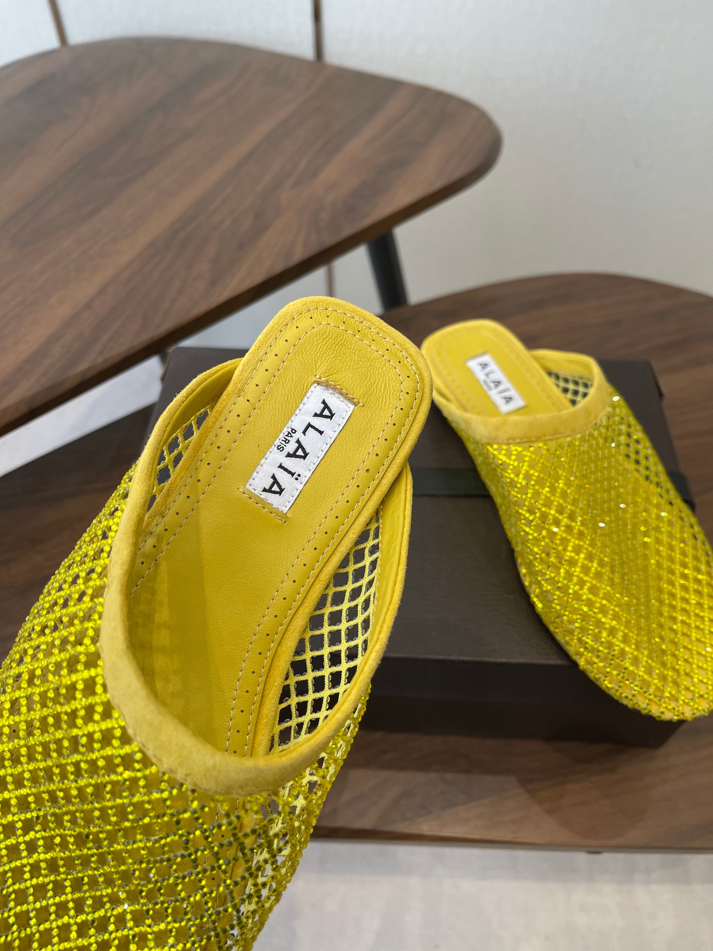 ALAIA 26S FLAT MULES IN DARK YELLOW SUEDE AND MESH RHINESTONE-EMBELLISHED