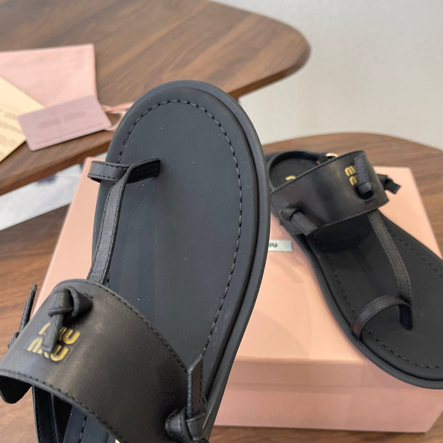 MIUMIU 26S FLIP FLOPS IN BLACK CALFSKIN