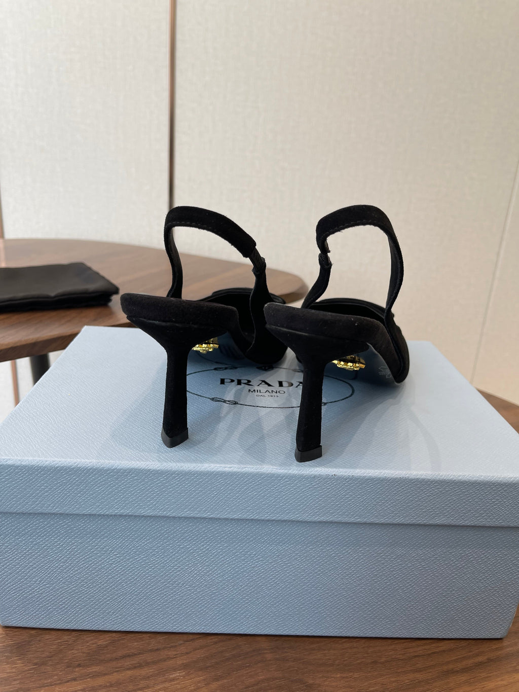 PRADA 26S SLINGBACK PUMPS 75MM IN BLACK SUEDE WITH LOGO