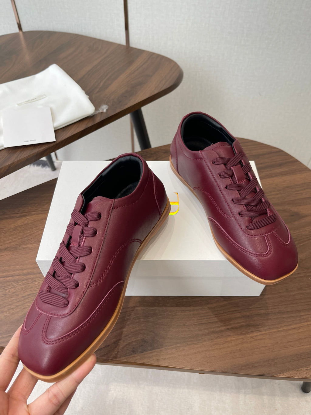THE ROW 26S SNEAKERS IN BURGUNDY RED CALFSKIN