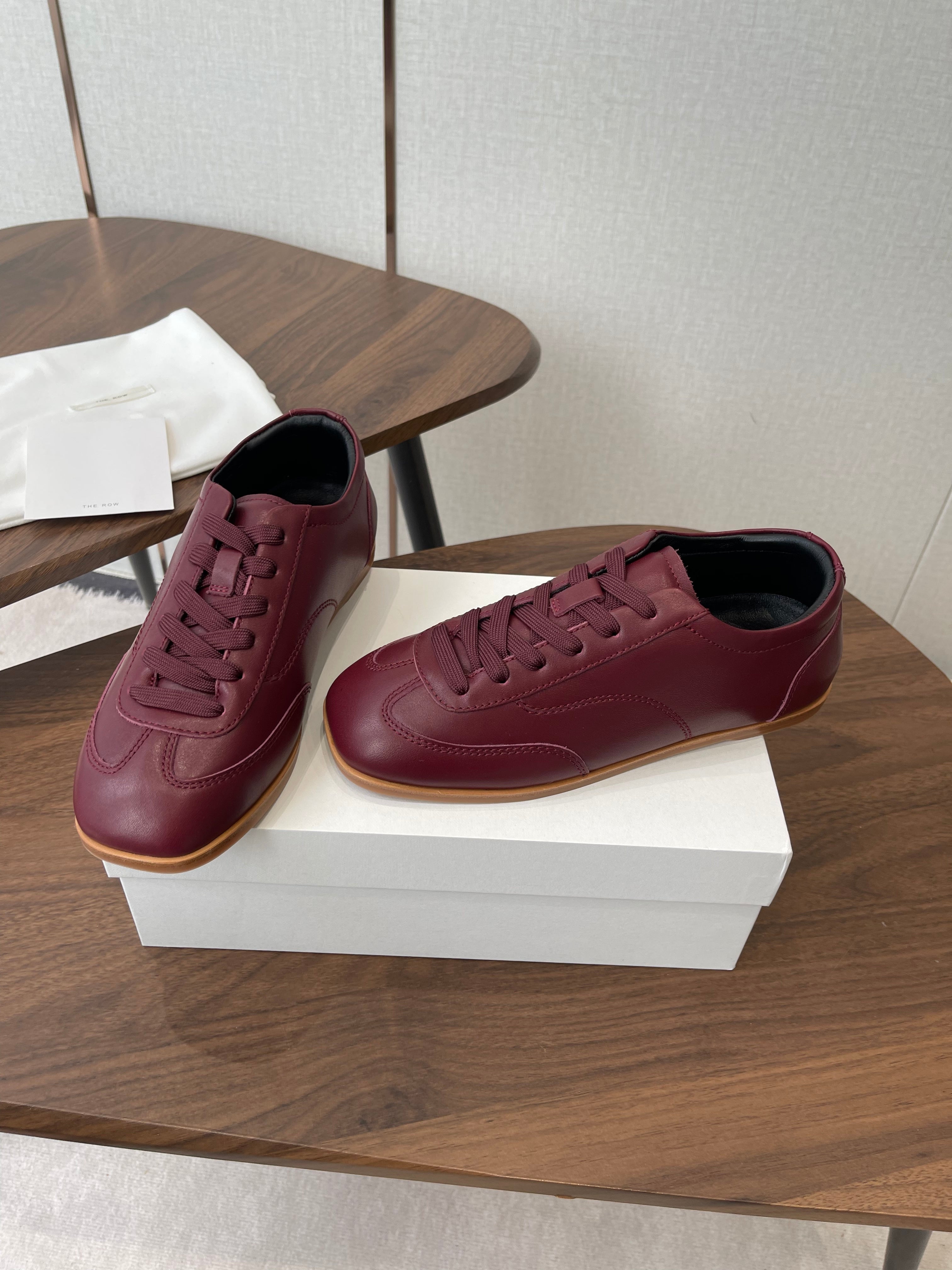 THE ROW 26S SNEAKERS IN BURGUNDY RED CALFSKIN