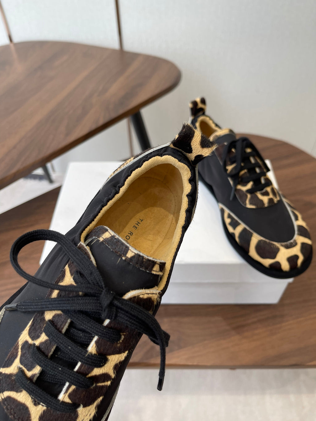 THE ROW 26S SNEAKERS IN LEOPARD PONY HAIR AND BLACK FABRIC
