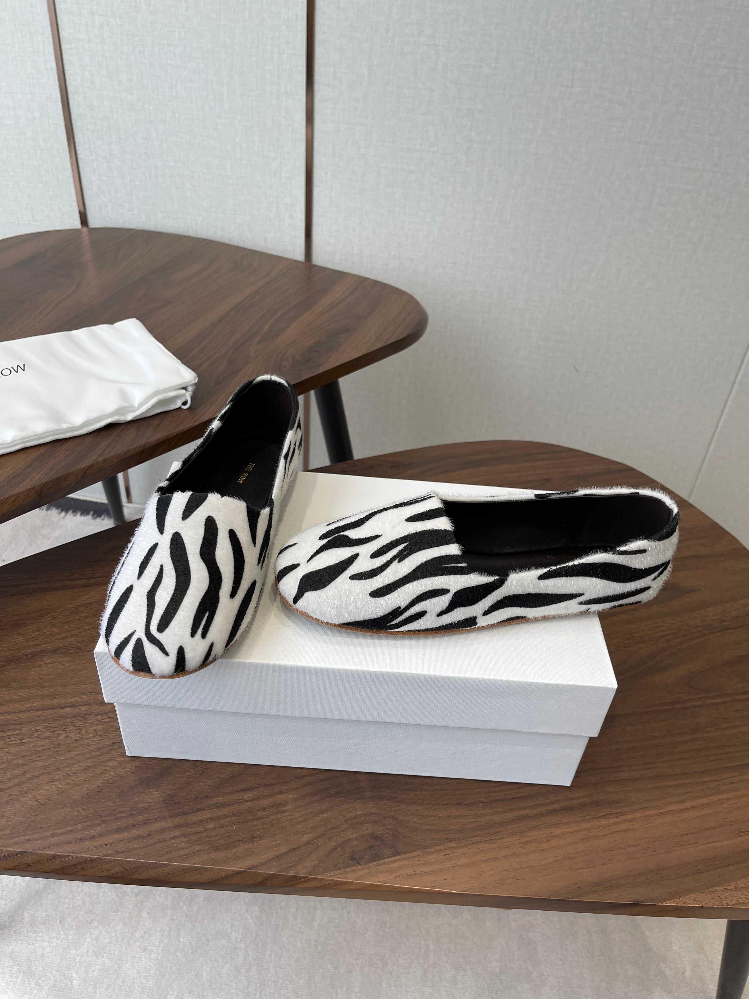 THE ROW 26S MARY JANES IN WHITE ZEBRA PRINT PONY HAIR