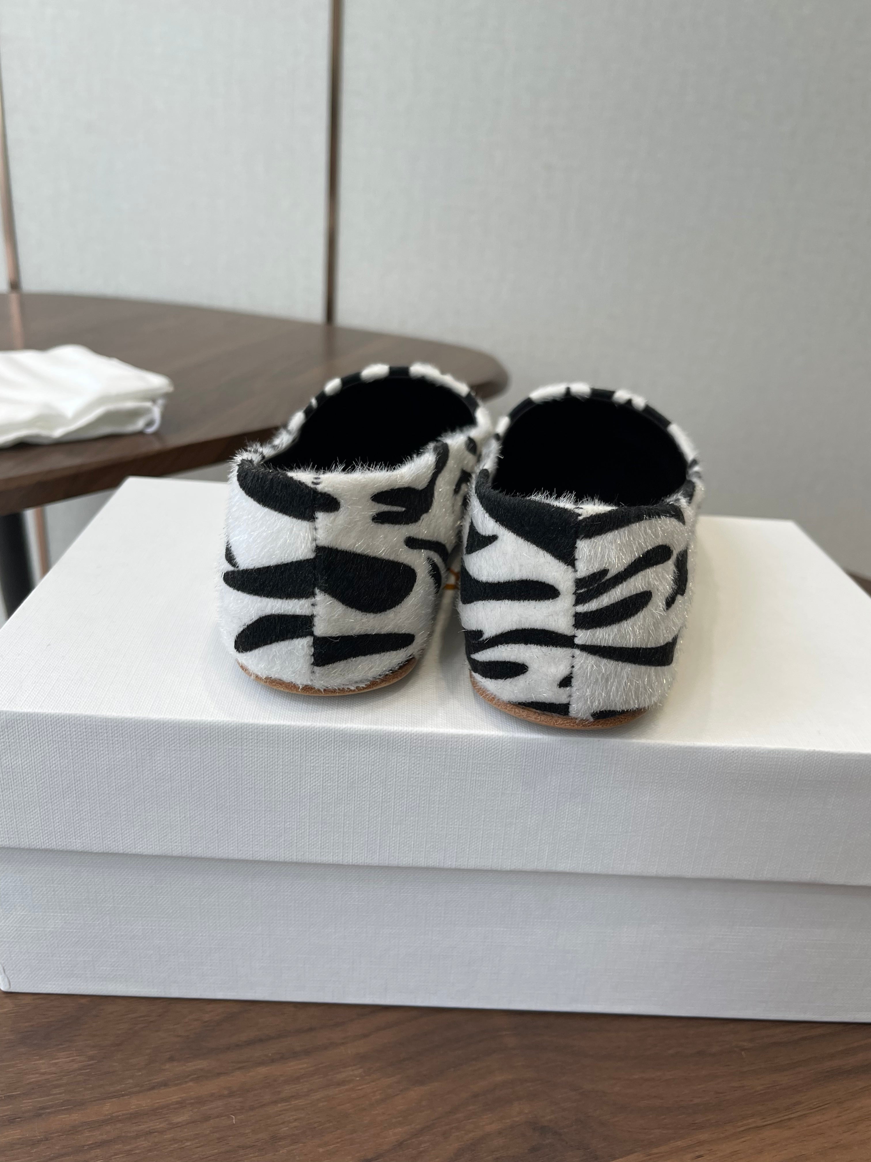 THE ROW 26S MARY JANES IN WHITE ZEBRA PRINT PONY HAIR