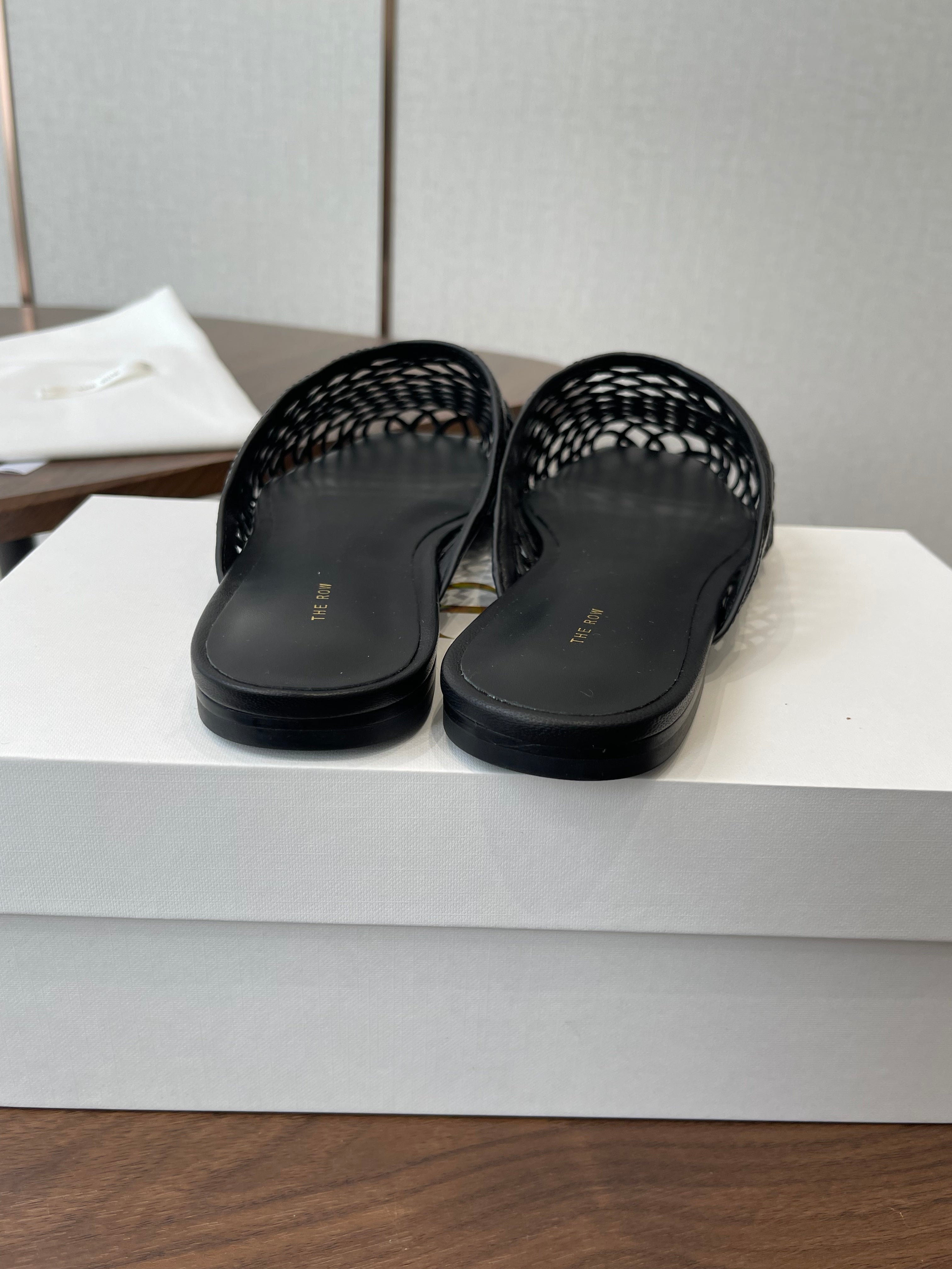 THE ROW 26S MULE SANDALS IN BLACK CALFSKIN