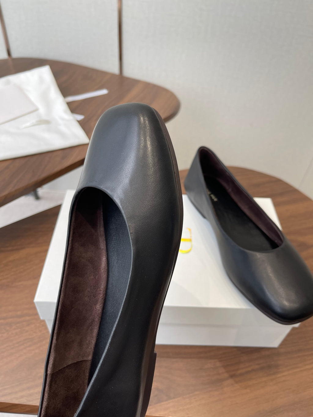 THE ROW 26S FLATS IN BLACK CALFSKIN