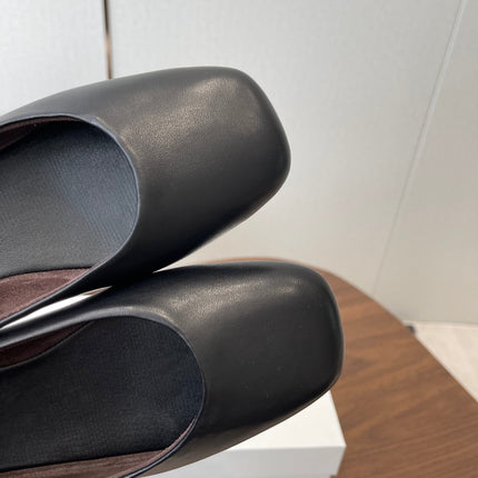 THE ROW 26S FLATS IN BLACK CALFSKIN
