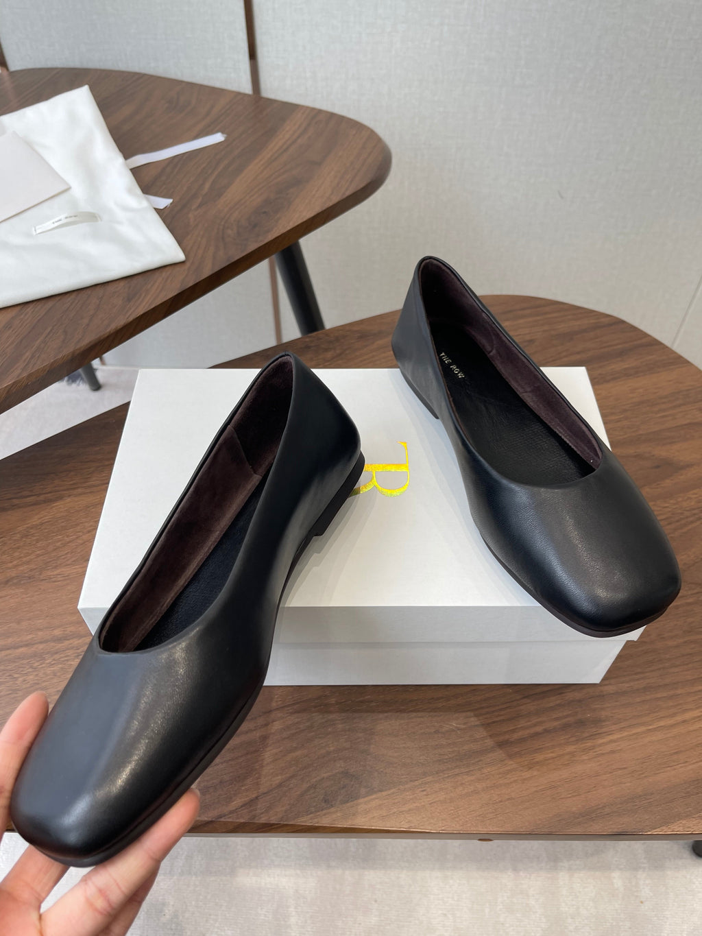 THE ROW 26S FLATS IN BLACK CALFSKIN