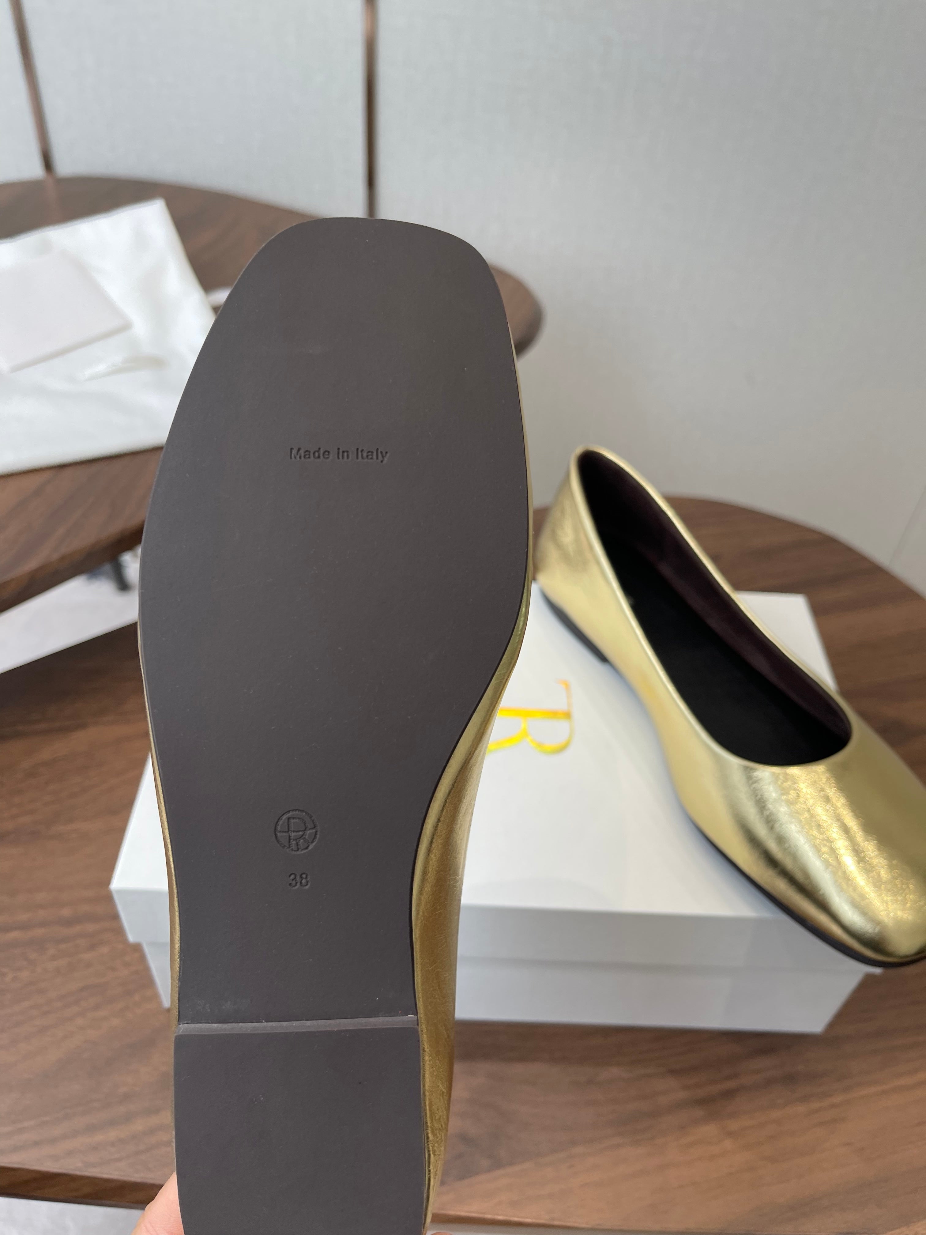 THE ROW 26S FLATS IN GOLD CALFSKIN