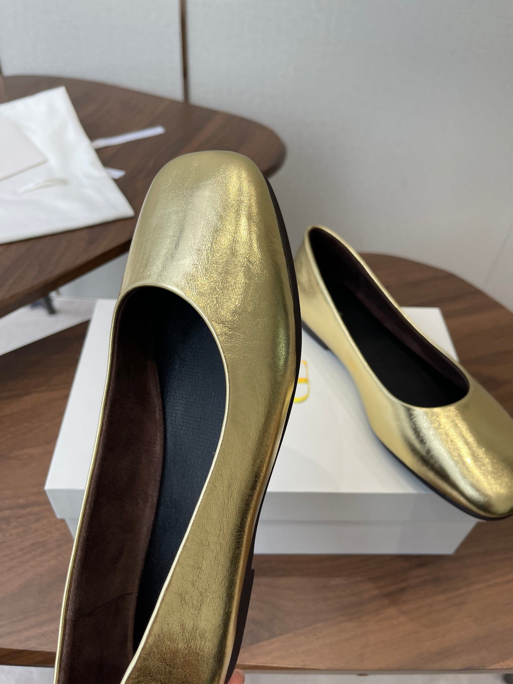 THE ROW 26S FLATS IN GOLD CALFSKIN