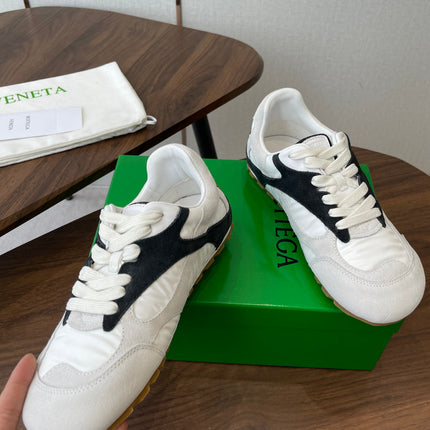 BOTTEGA VENETA 26S ORBIT FLASH SNEAKERS IN WHITE AND BLACK SUEDE