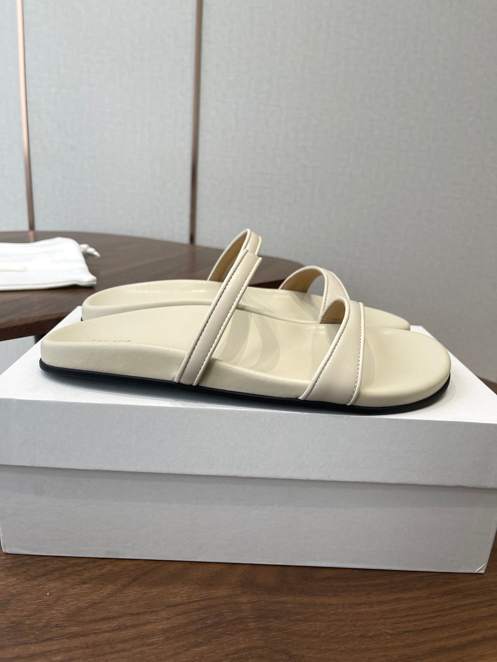 THE ROW 26S DOUBLE STRAP FLAT SANDALS IN IVORY WHITE CALFSKIN