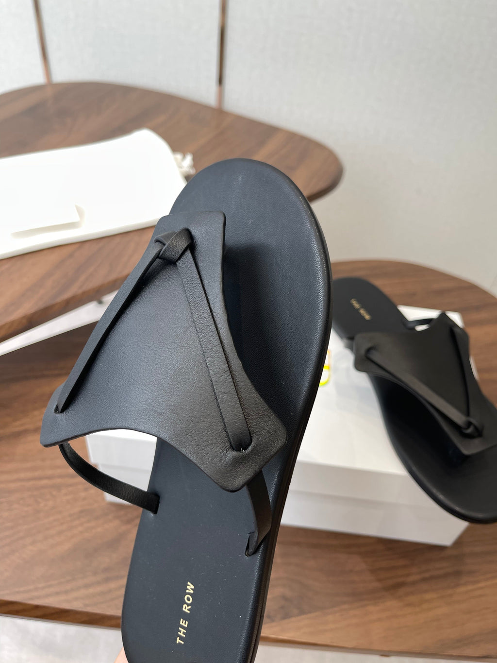 THE ROW 26S T STRAP THONG SANDALS IN BLACK CALFSKIN
