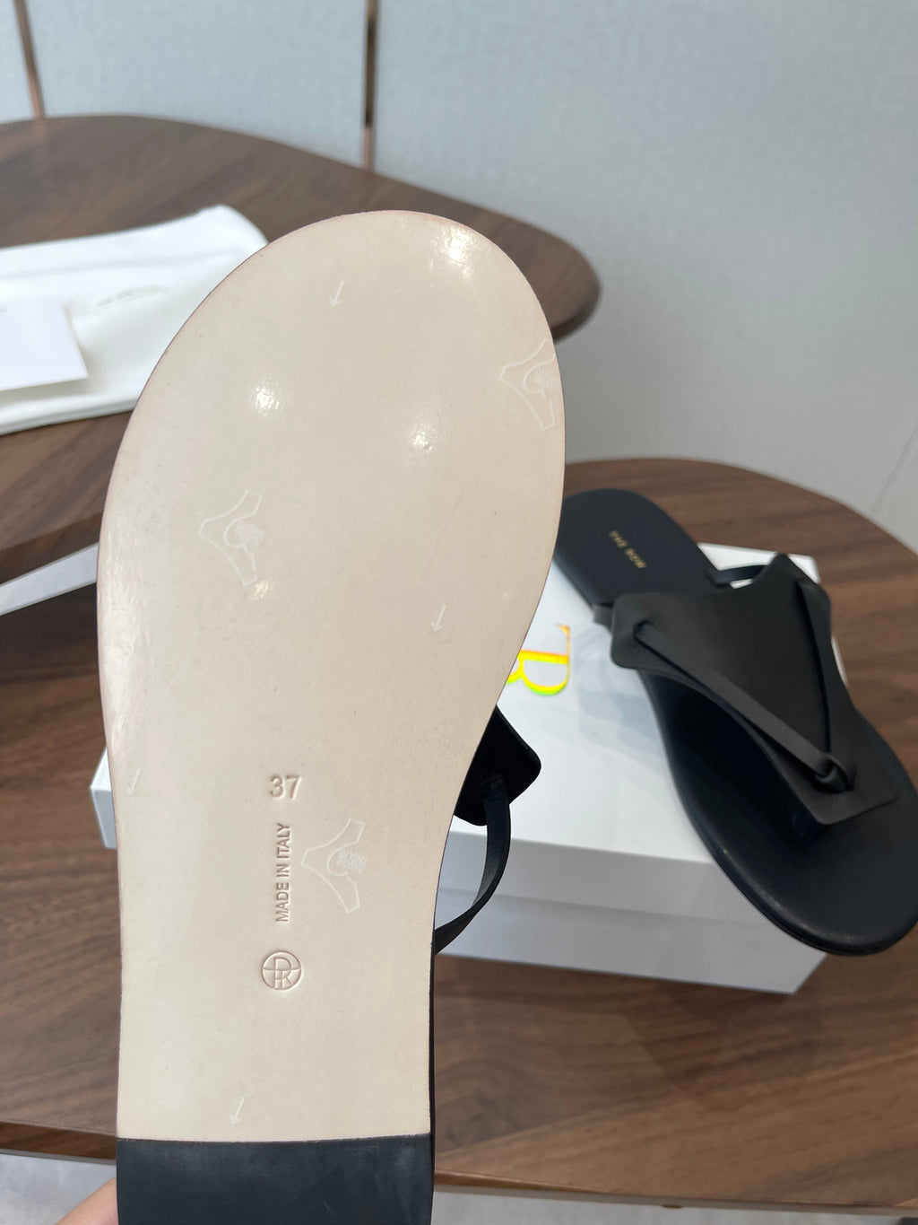 THE ROW 26S T STRAP THONG SANDALS IN BLACK CALFSKIN