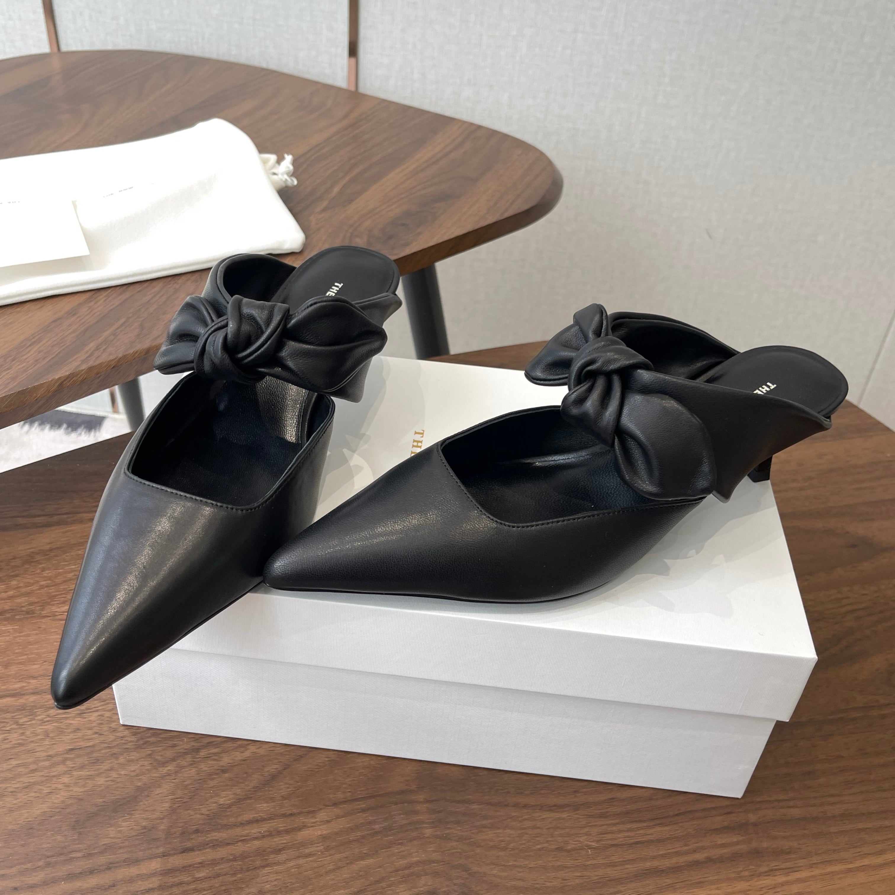 THE ROW 26S SLINGBACK POINTED HEELS IN BLACK CALFSKIN WITH BOW