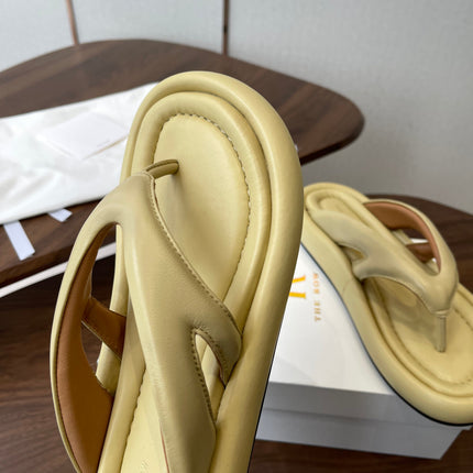 THE ROW 26S PUFFED THONG SANDALS IN BUTTER YELLOW CALFSKIN