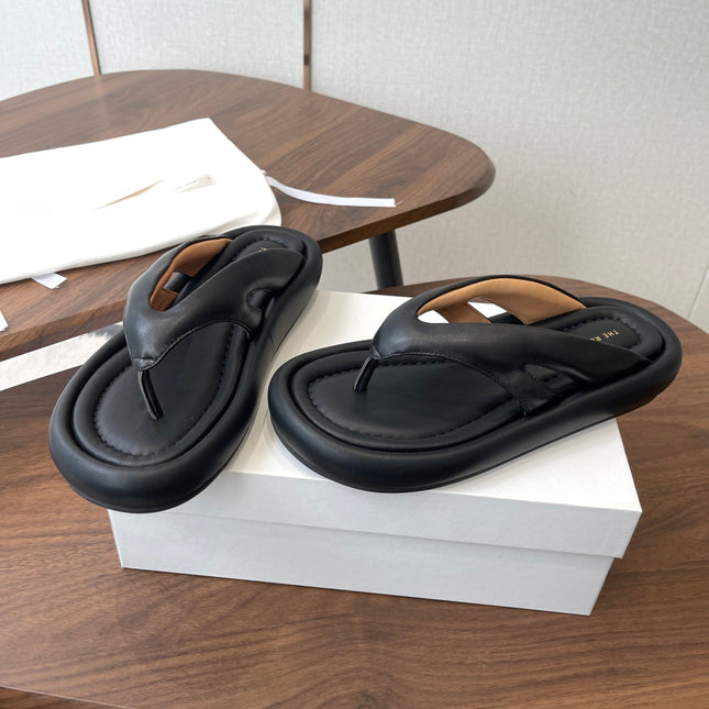 THE ROW 26S PUFFED THONG SANDALS IN BLACK CALFSKIN