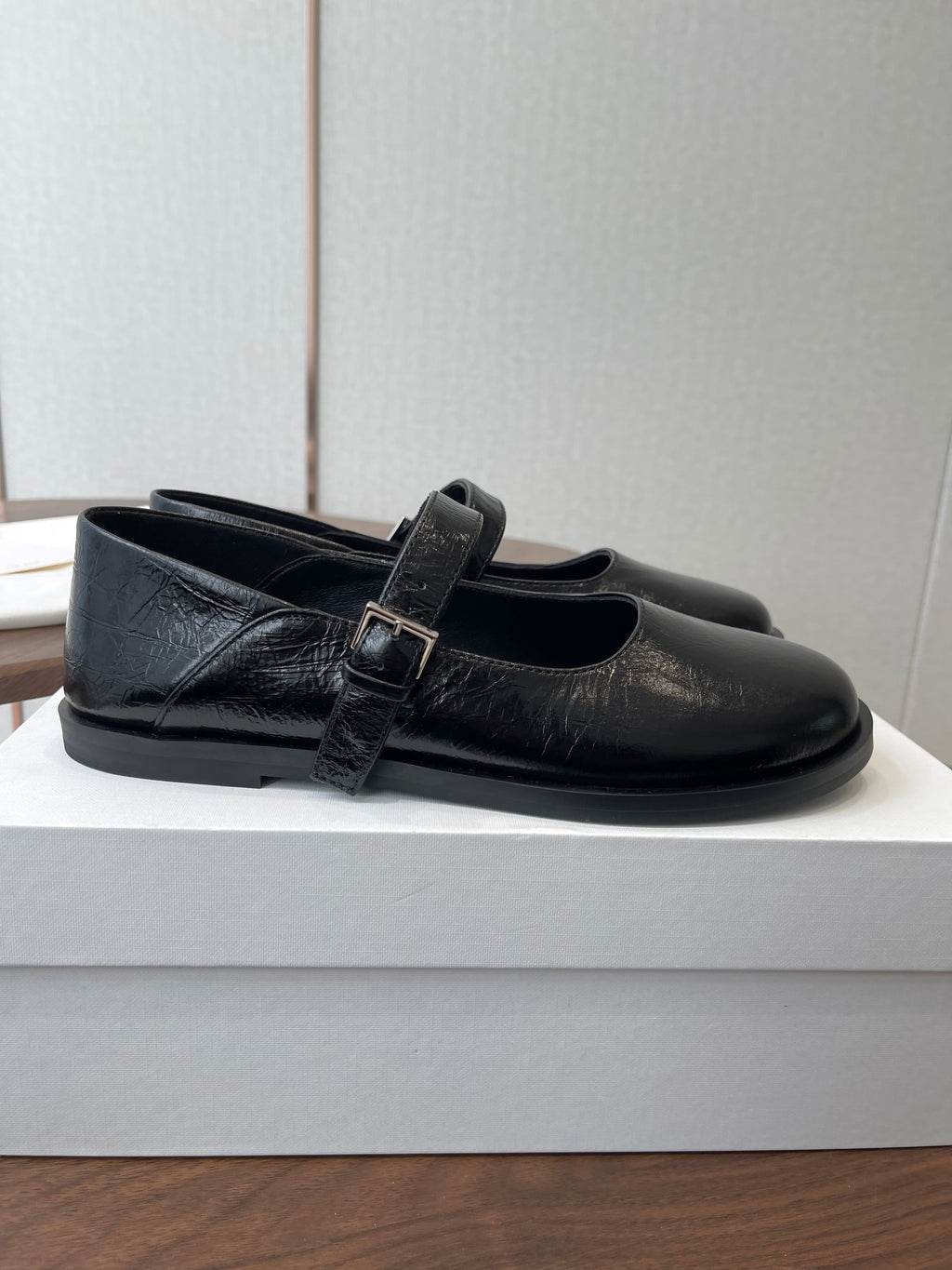 THE ROW 26S MARY JANE FLATS IN BLACK PATENT CALFSKIN